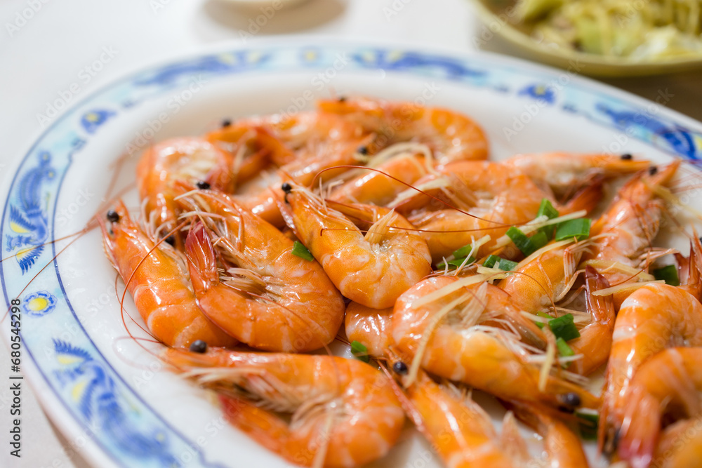 Cooked shrimp on the white plate