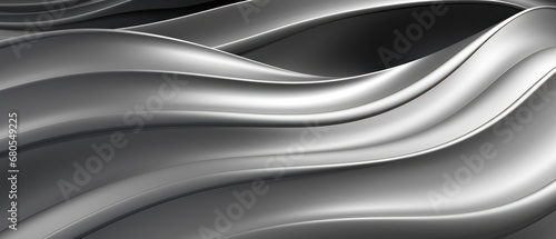 Elegant wavy composition of silver curves on a black and white backdrop.