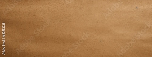 Smooth brown leather texture, classic and versatile for backgrounds in fashion and luxury goods design.