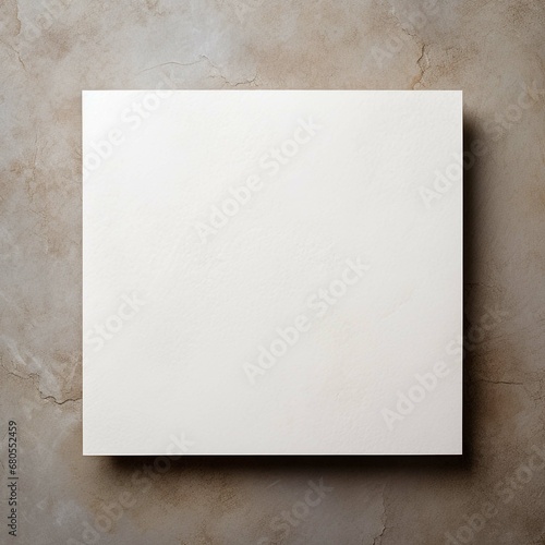 Blank square white card with copy space lying on a background of coloured marble Generative AI	
