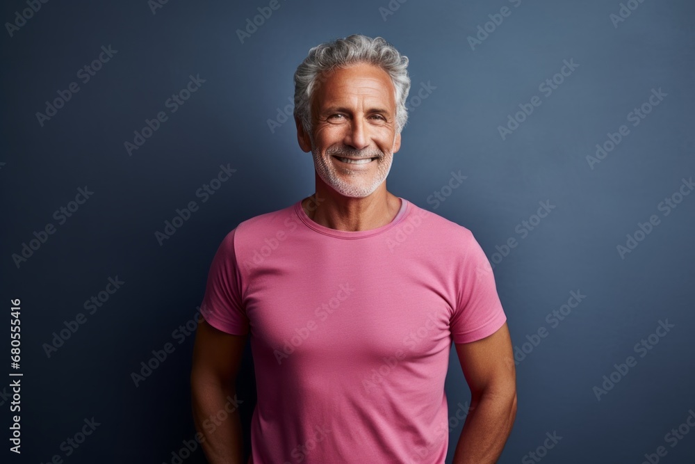 Portrait of a blissful man in his 70s sporting a technical climbing shirt against a minimalist or empty room background. AI Generation Portrait of a blissful man in his 70s sporting a technical climbing shirt against a minimalist or empty room background. AI Generation