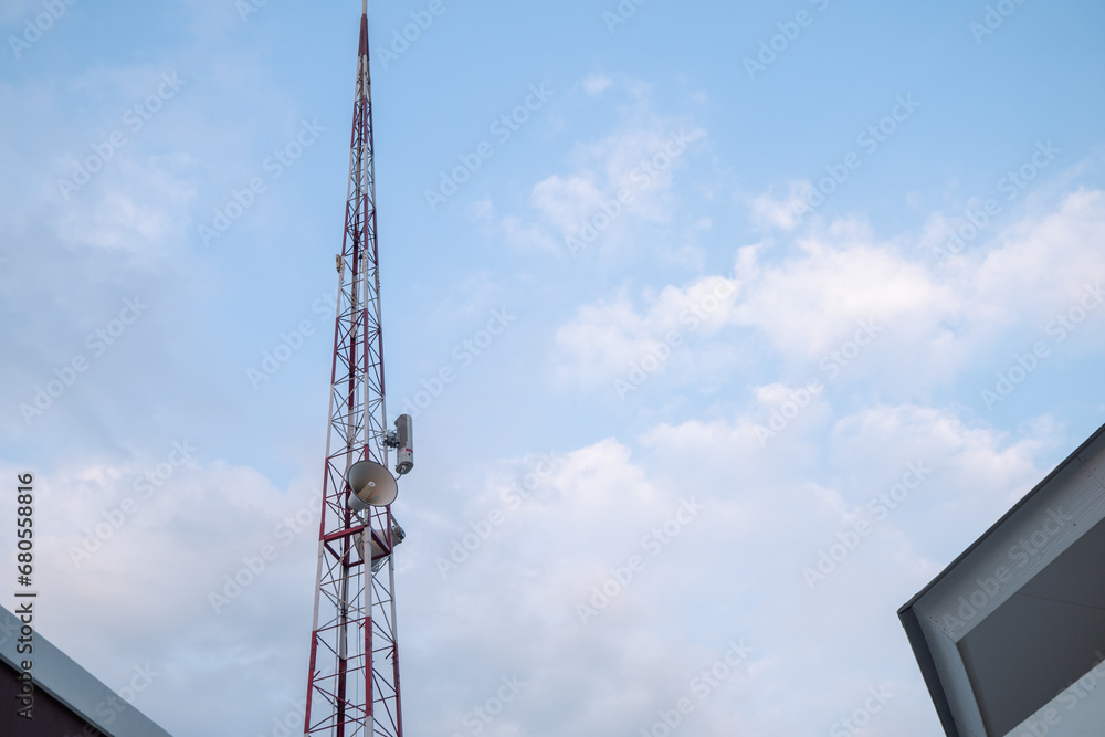 Telecommunication tower on the peak of mountain. The photo is suitable to use for telecommunication and technology background.