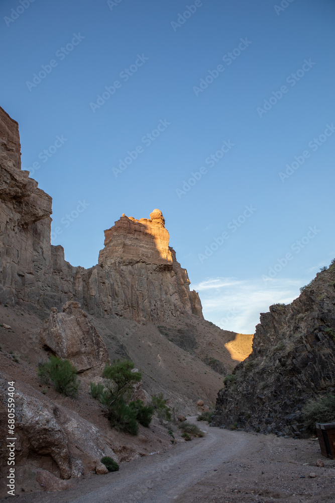 Fototapeta premium Charyn Canyon is a canyon on the Sharyn River in Kazakhstan east of Almaty. Landscape on a clear sunny day in summer