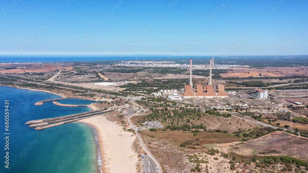 Aerial view of a coal-fired power plant in the city of Sines and sea channels to cool the station.
