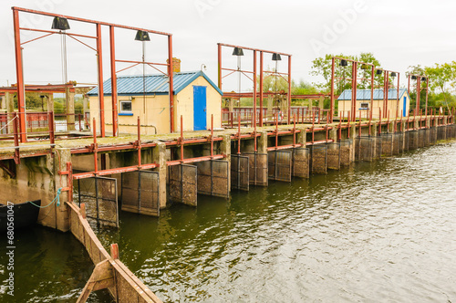 Wooden and metal locks at the River Bann, at the world's largest eel fisher, Lough Neagh, Northern Ireland. photo