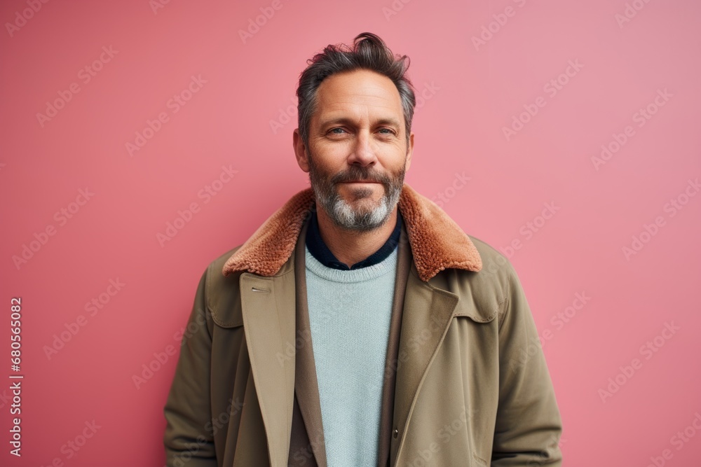Portrait of a blissful man in his 40s sporting a vintage band t-shirt against a solid pastel color wall. AI Generation Portrait of a blissful man in his 40s sporting a vintage band t-shirt against a solid pastel color wall. AI Generation