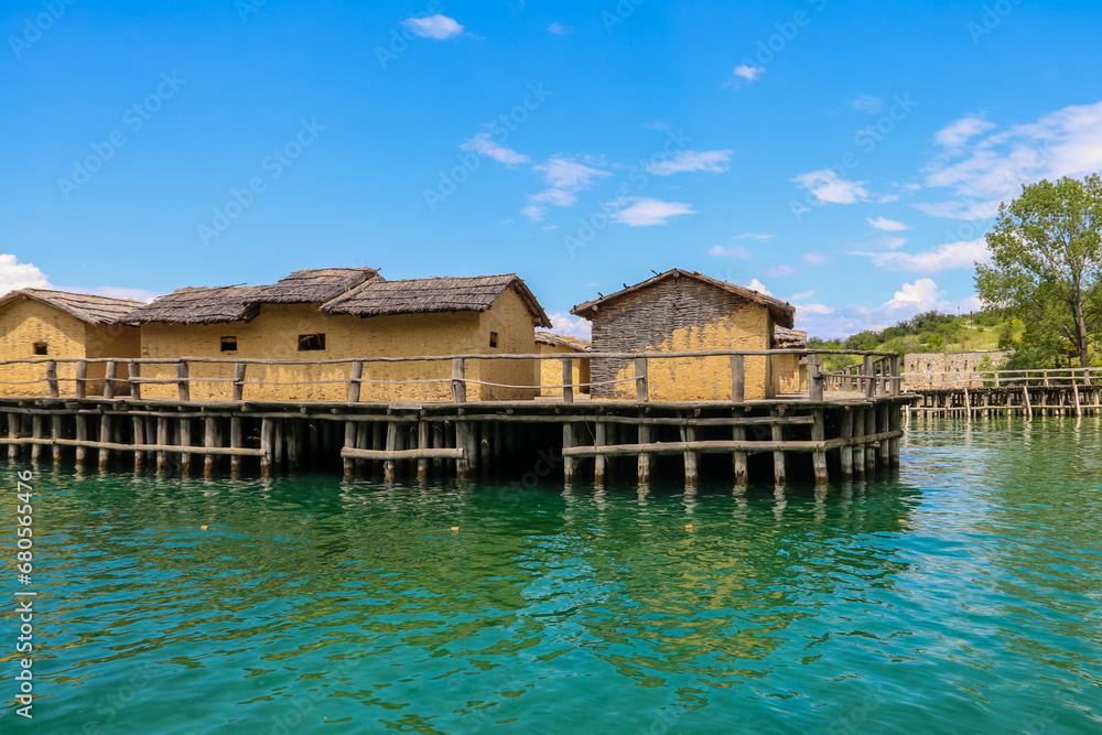 Museum on water, Bay of Bones, prehistoric pile-dwelling, recreation of a bronze age settlement on Lake Ohrid, North Macedonia Museum on water, Bay of Bones, prehistoric pile-dwelling, recreation of a bronze age settlement on Lake Ohrid, North Macedonia