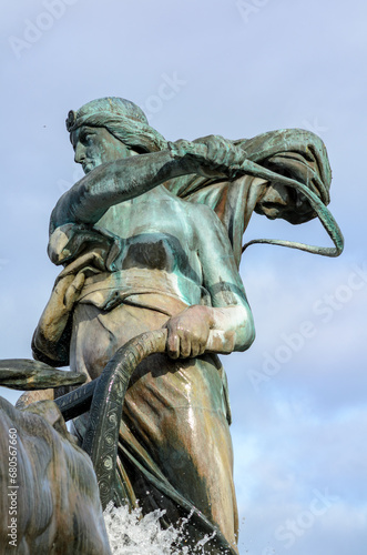 The Gefion fountain in Copenhagen, Denmark. It features a large-scale group of oxen pulling a plow and being driven by the Norse goddess Gefjon