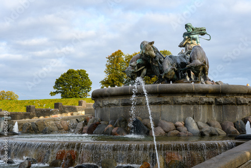 The Gefion fountain in Copenhagen, Denmark. It features a large-scale group of oxen pulling a plow and being driven by the Norse goddess Gefjon