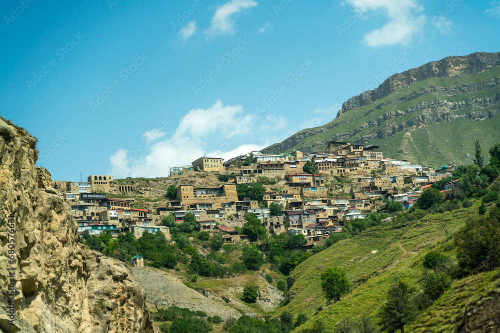 Fototapeta premium Chokhsky terraces Dagestan. Landscape of mountainous Dagestan with terraced fields and peaks mountains in the distance.