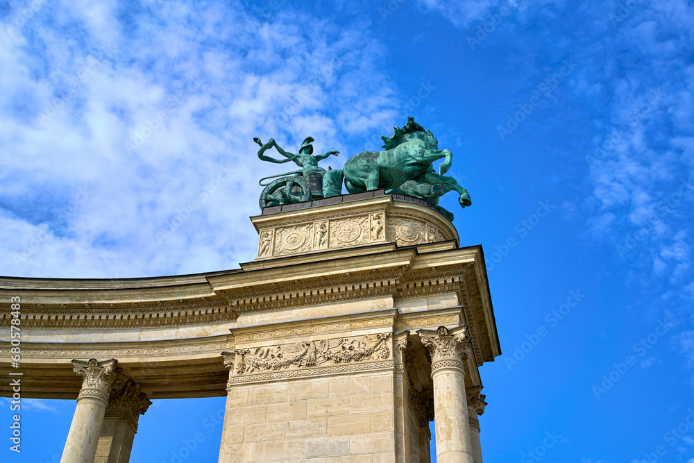 Statue depicting a rider in a chariot on top of the arch at Heroes' Square in central Budapest, Hungary.