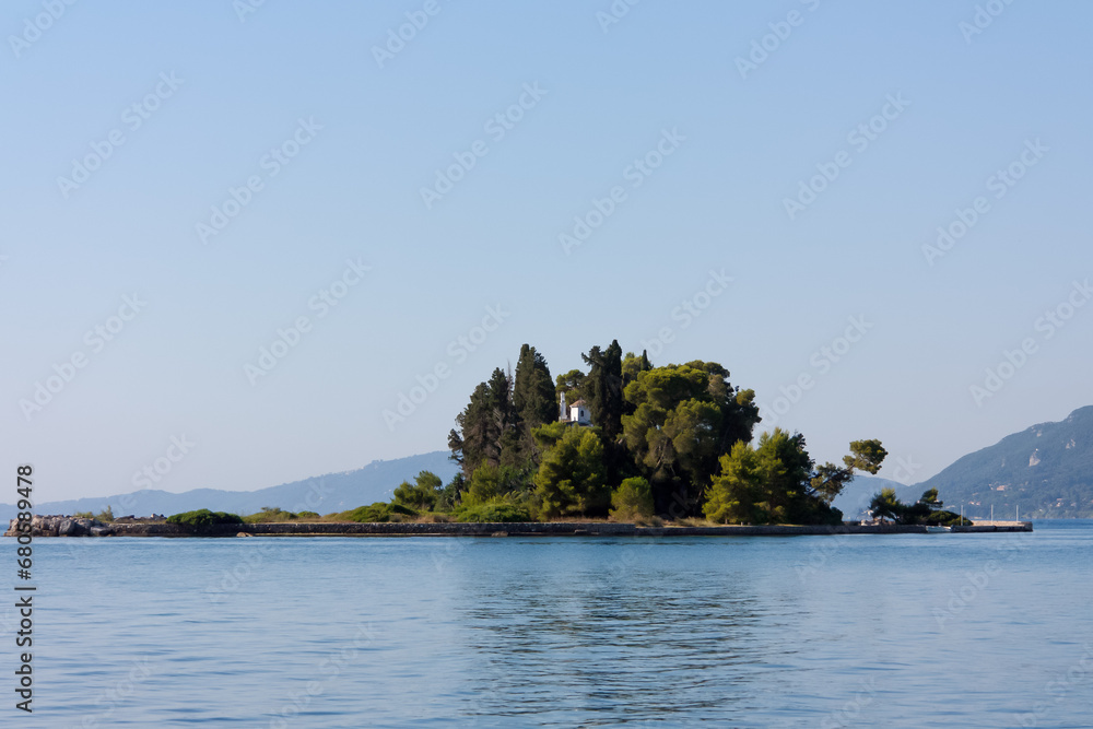Island with a building on the water, Corfu Island with a building on the water, Corfu