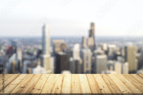 Wooden table top with beautiful blurry skyline on background  mockup