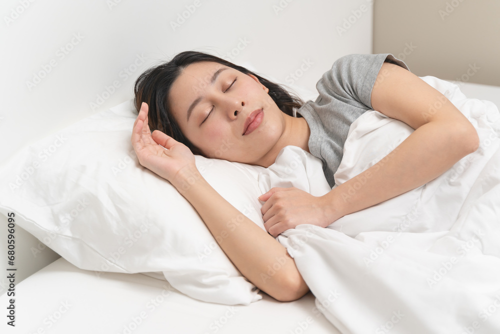 Wellness lifestyles concept, Young women sleep well on the bed with good condition and clean bedchamber Wellness lifestyles concept, Young women sleep well on the bed with good condition and clean bedchamber
