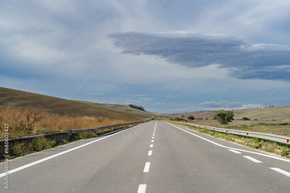 Straight empty road, Basilicata, Italy