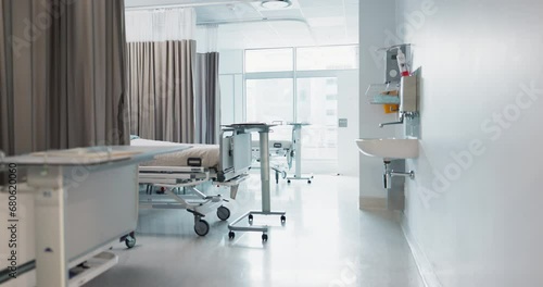 Hospital, modern and interior of bedroom or empty room for healthcare, consulting or healing. Background, medical and clinic space for emergency, rehabilitation or recovery with furniture or light
