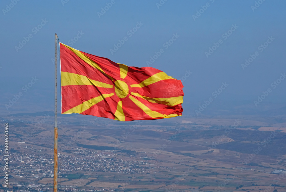 Obraz na płótnie The national flag of North Macedonia waving in the wind in Skopje w salonie