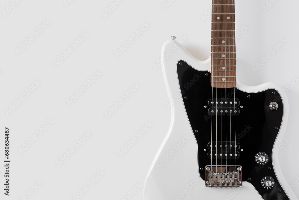 White electric guitar. Musical instrument