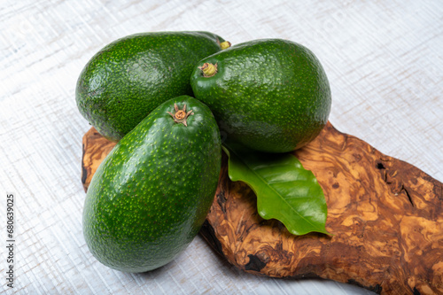 Green ripe avocado fruits from organic avocado plantation - healthy food