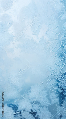 Winter frosted window glass blue color vertical background