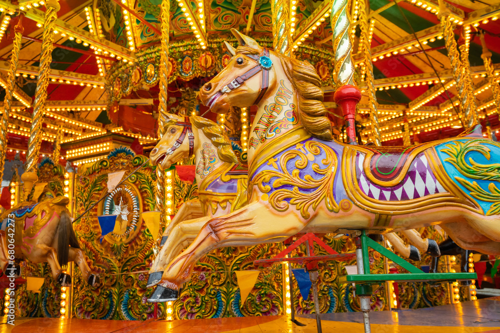 Vintage carousel. Carousel horse. Merry-Go-Round. Galloping horses.