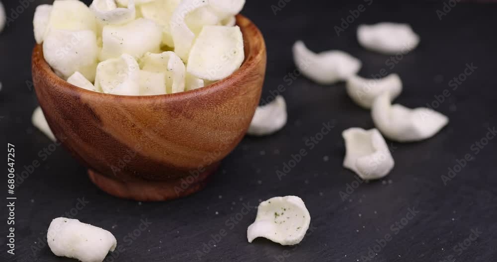 potato chips made of mashed potatoes with spices, delicious but harmful chips made of mashed potatoes and fragrant herbal spices potato chips made of mashed potatoes with spices, delicious but harmful chips made of mashed potatoes and fragrant herbal spices