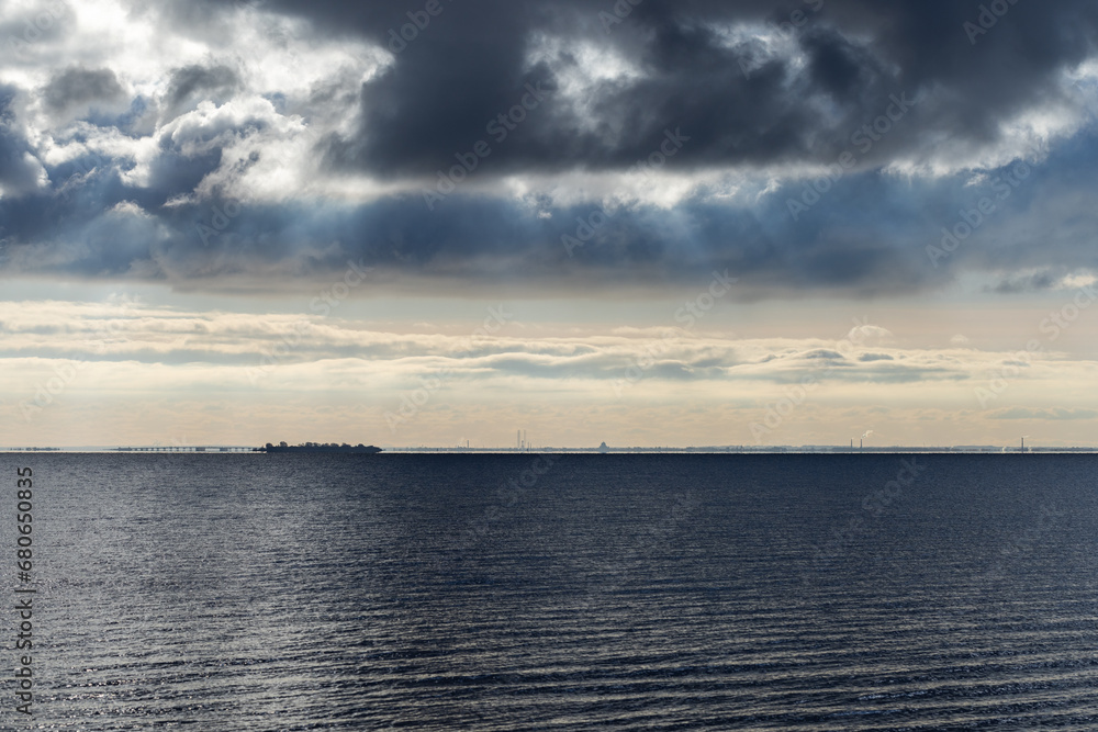 Dramatic stormy dark cloudy sky over the sea, Kotlin island Dramatic stormy dark cloudy sky over the sea, Kotlin island