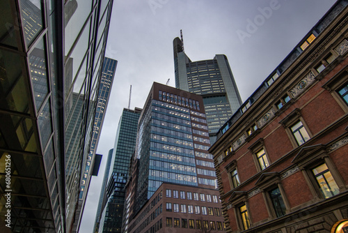 Photos from and in the skyline of Frankfurt. Beautiful modern high-rise buildings in the glow of the sunset. Sunset over Germany