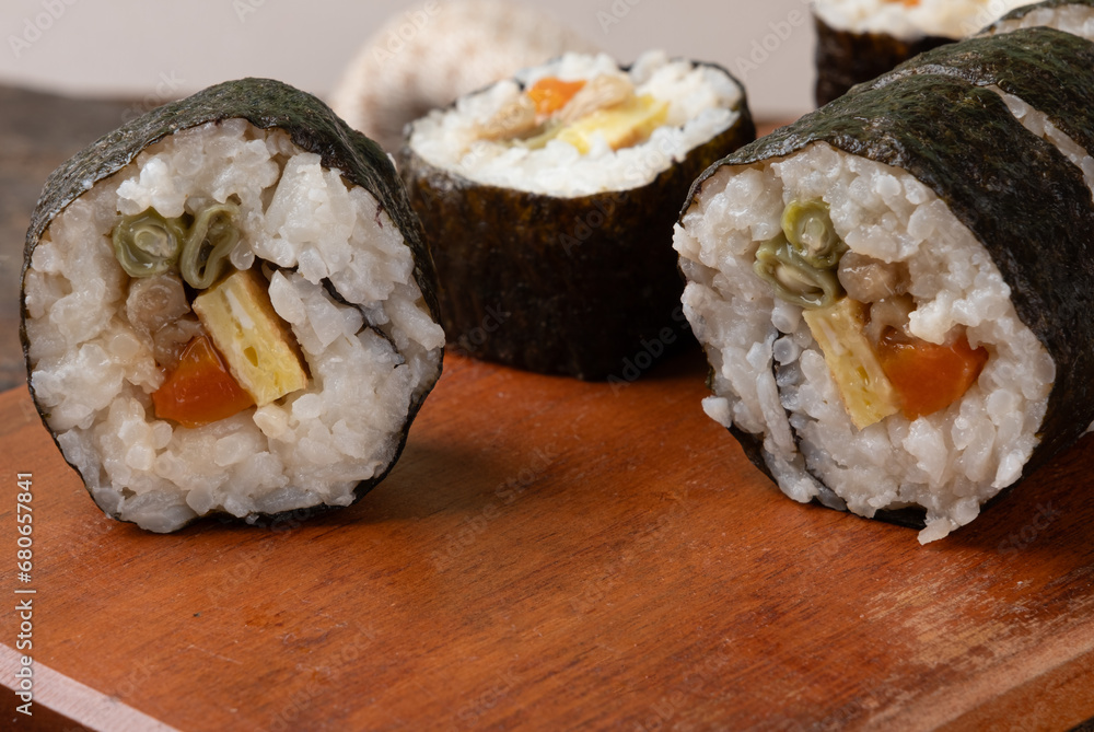 Delicious traditional Japanese sushi roll. Selective focus. Delicious traditional Japanese sushi roll. Selective focus.