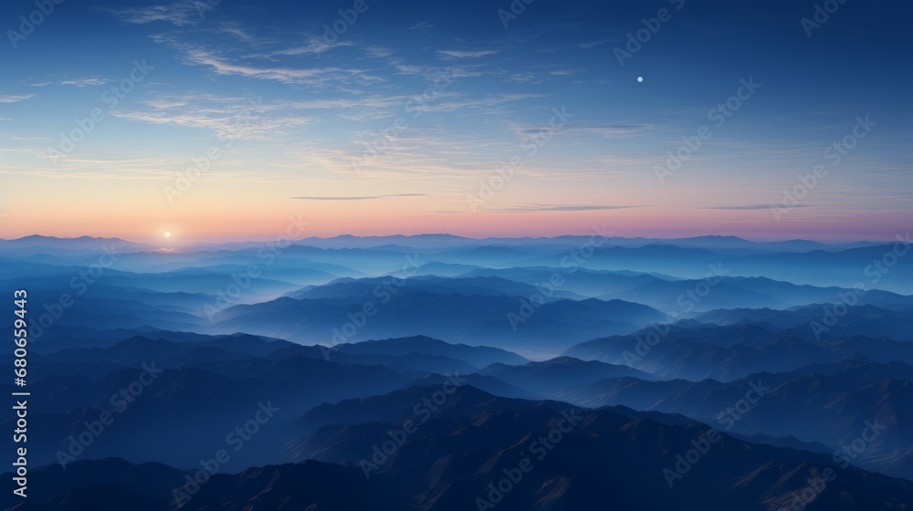 aerial picture of twilight sunset, haze in valley under a clear dark blue sky, copy space, 16:9