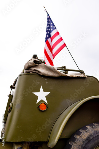 Old american army car with usa flag