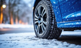 close-up of winter car tires on a snowy road