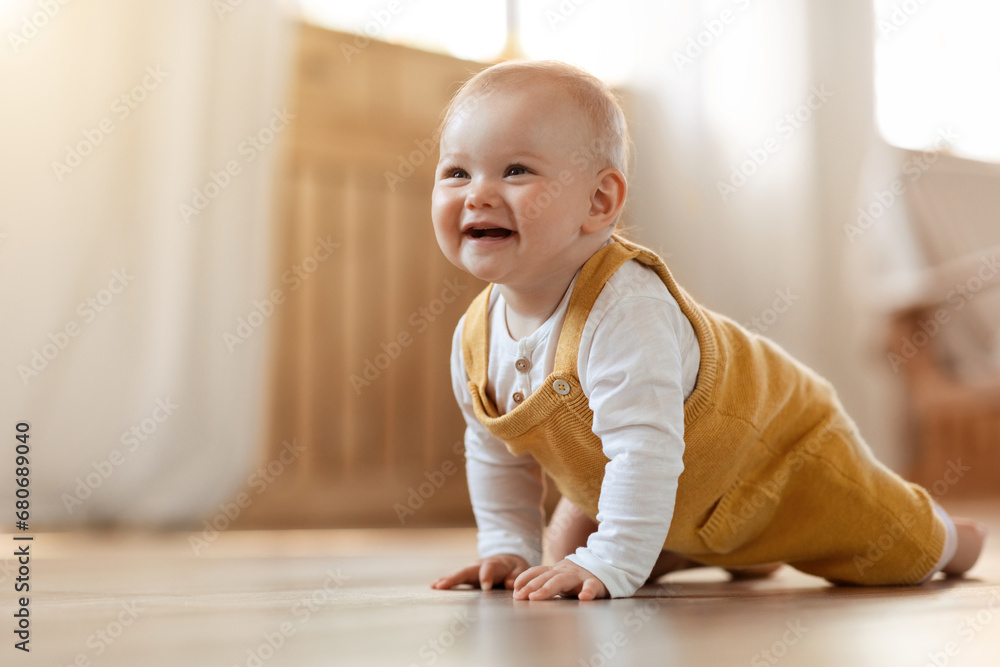 Cute little baby boy discovering world, crawling by home - obrazy, fototapety, plakaty 