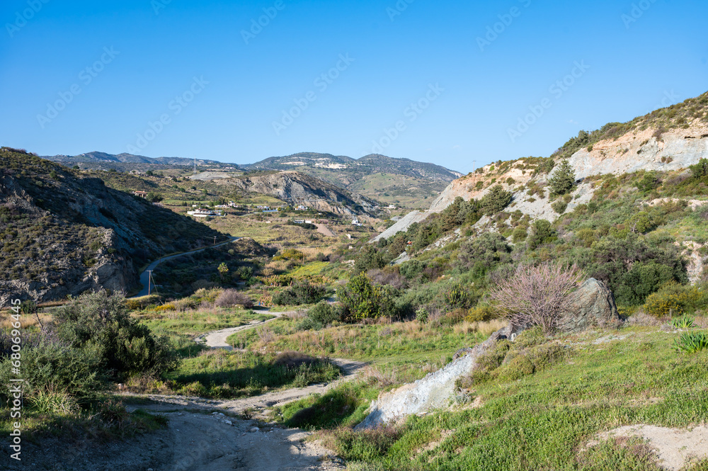 Rocky mountains and green hills over blue sky, Cyprus Rocky mountains and green hills over blue sky, Cyprus