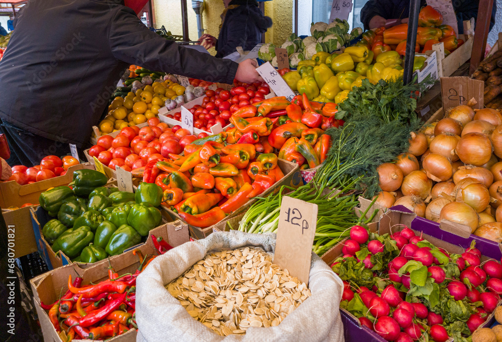 A variety of fresh fruits, seeds, nuts and vegetables on display at the market. Food