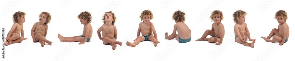 line of a group of same boy in underpants sitting on the floor on white background (3 year old) line of a group of same boy in underpants sitting on the floor on white background (3 year old)