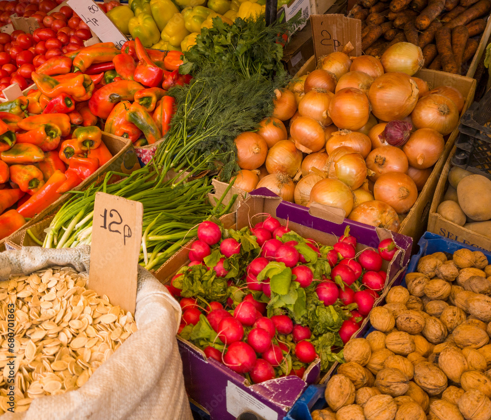 A variety of fresh fruits, seeds, nuts and vegetables on display at the market. Food