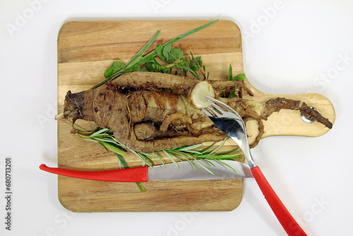 old vegetable variety oat root, cooked on a wooden board photo