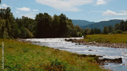Wide view of river Dee in the Royal Deeside, Aberdeenshire, Scotland, England, UK, a region made famous by Queen Victoria photo
