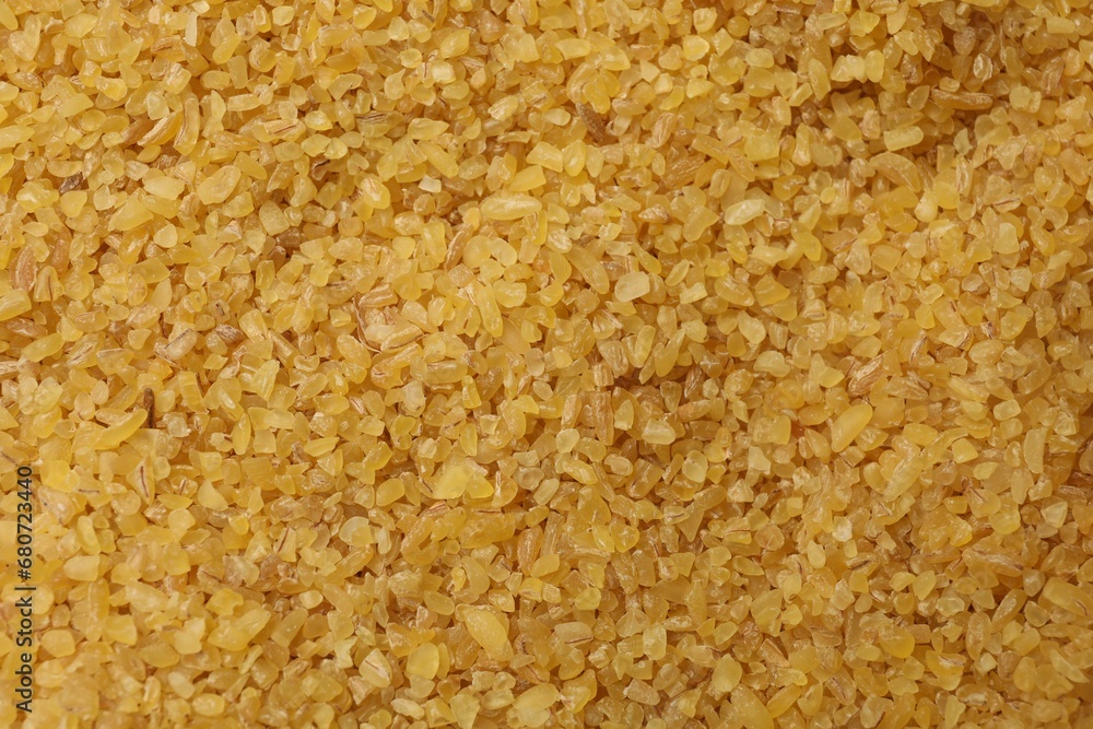 Pile of raw bulgur as background, top view Pile of raw bulgur as background, top view