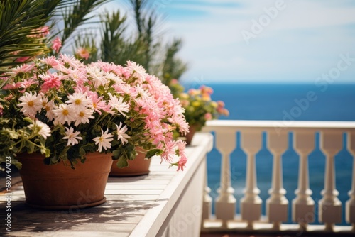 Seaside Balcony Retreat: Retreat to a serene balcony paradise as captured in this close-up, showcasing meticulous landscaping against the ocean expanse, embodying the tranquility of spring