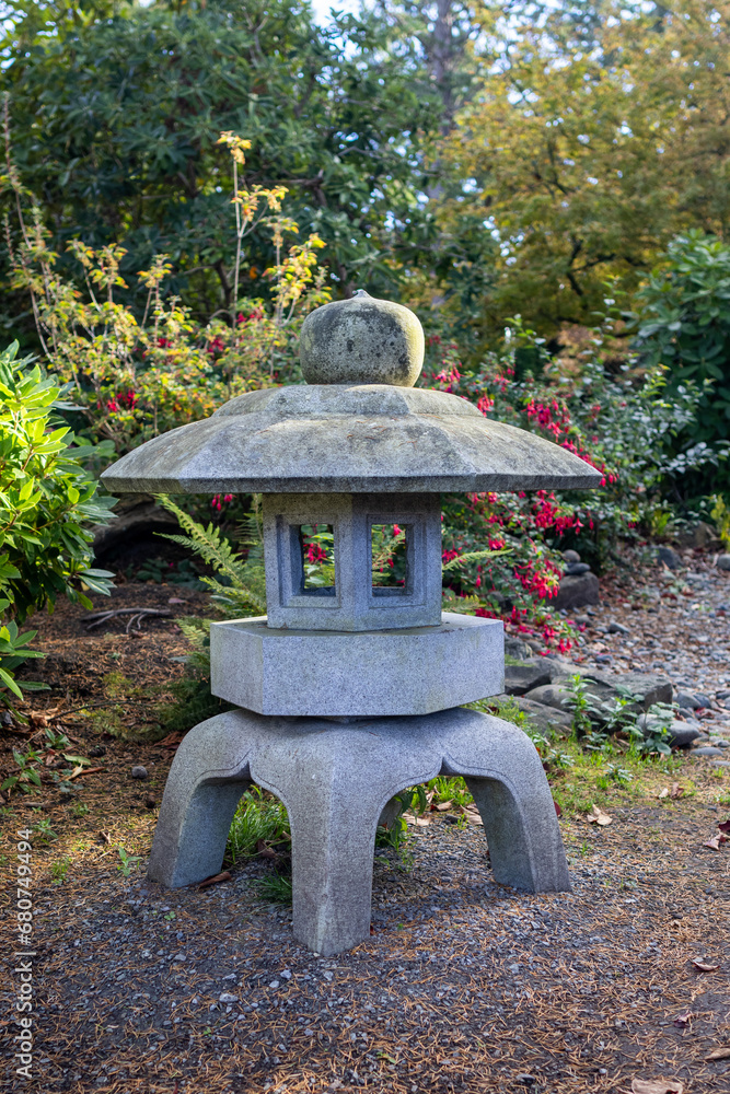 Stone garden lantern in the sunlight Stone garden lantern in the sunlight