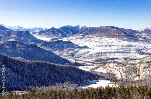 Panoramic view of the winter snow-covered landscape of Sunlight Basin from the top of Dead Indian Pass in northwest Wyoming.