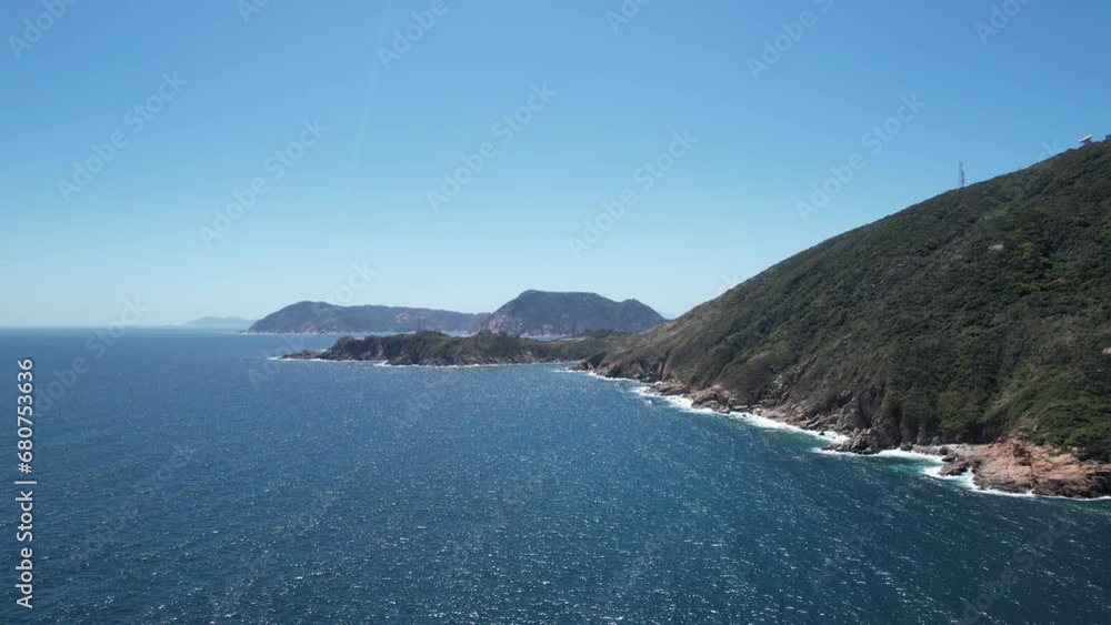 Aerial drone shot of a rocky mountain geological formations in Hong Kong Cape D Aguilar with ocean view on sunny near Stanley, Shek O and Repluse Bay Aerial drone shot of a rocky mountain geological formations in Hong Kong Cape D Aguilar with ocean view on sunny near Stanley, Shek O and Repluse Bay