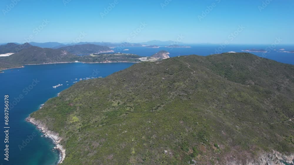 Aerial drone shot of a rocky mountain geological formations in Hong Kong Cape D Aguilar with ocean view on sunny near Stanley, Shek O and Repluse Bay Aerial drone shot of a rocky mountain geological formations in Hong Kong Cape D Aguilar with ocean view on sunny near Stanley, Shek O and Repluse Bay