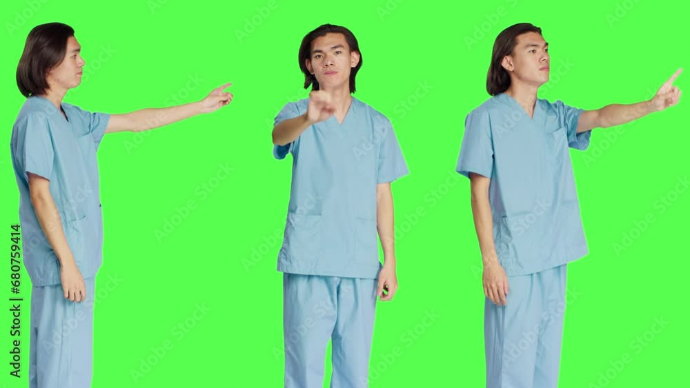 Medical assistant doing no symbol on camera, showing negative reaction and disagreement. Asian healthcare worker being displeased about something, disagreeing and disapproving. Medical assistant doing no symbol on camera, showing negative reaction and disagreement. Asian healthcare worker being displeased about something, disagreeing and disapproving.