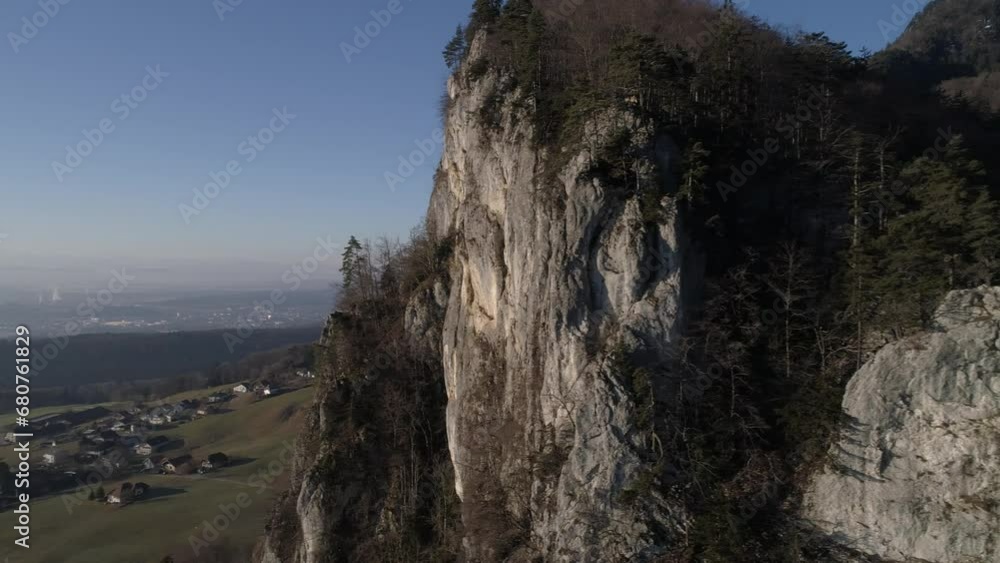 Flight through Klus, gorge incision near Zwueschbergen with the Balmflue, first Jura chain, in the background Balm near Guensberg, drone image, Solothurn, Switzerland, Europe Flight through Klus, gorge incision near Zwueschbergen with the Balmflue, first Jura chain, in the background Balm near Guensberg, drone image, Solothurn, Switzerland, Europe