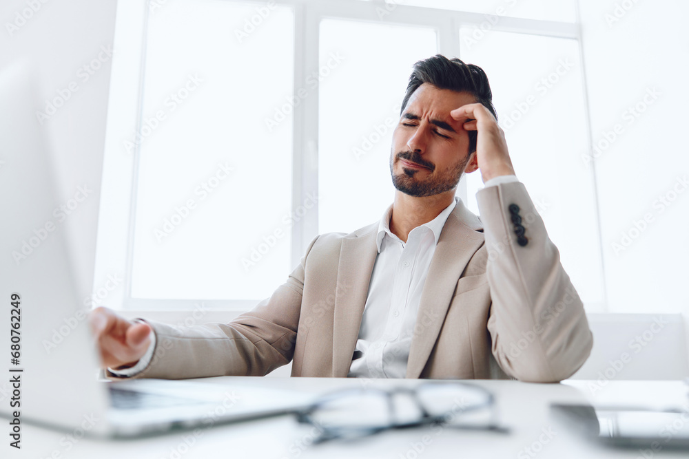 Businessman man happy office smiling online wireless computer laptop communication sitting executive business Businessman man happy office smiling online wireless computer laptop communication sitting executive business