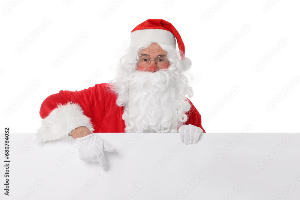 Man in Santa Claus costume posing and pointing on white background Man in Santa Claus costume posing and pointing on white background