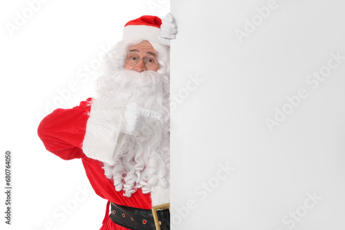 Man in Santa Claus costume posing on white background © New Africa